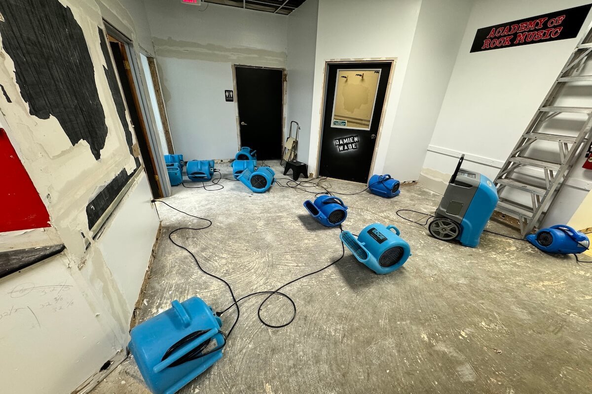 Commercial drying setup after flood cleanup — example from our water damage restoration cost Hampton Roads guide.